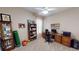 Cozy bedroom featuring a desk and ample shelving, perfect for an office or study at 4506 Gentrice Dr, Valrico, FL 33596