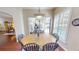 Dining area with views of the outdoor patio and pool at 4506 Gentrice Dr, Valrico, FL 33596