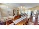 Open dining area with a chandelier and a view of the living room at 4506 Gentrice Dr, Valrico, FL 33596