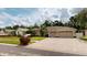 Beautiful single-story home featuring a paver driveway and a well-manicured lawn at 4506 Gentrice Dr, Valrico, FL 33596