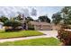 Beautiful single-story home featuring a manicured lawn and two-car garage at 4506 Gentrice Dr, Valrico, FL 33596