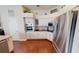 Stylish kitchen with white cabinets, stainless steel appliances, and modern finishes at 4506 Gentrice Dr, Valrico, FL 33596