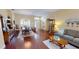 Living room with hardwood floors, dining area, and comfortable seating arrangement at 4506 Gentrice Dr, Valrico, FL 33596