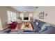 Spacious living room with built-in shelving, plush seating, and plantation shutters at 4506 Gentrice Dr, Valrico, FL 33596