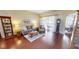 Bright and cozy living room with beautiful hardwood floors and plenty of natural light at 4506 Gentrice Dr, Valrico, FL 33596