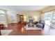 Bright living room with hardwood floors and a comfortable seating arrangement at 4506 Gentrice Dr, Valrico, FL 33596