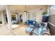 Inviting covered patio with comfortable seating and ceiling fans, perfect for relaxation and entertaining at 4506 Gentrice Dr, Valrico, FL 33596