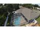 Aerial view shows a screened in backyard pool, perfect for relaxing and entertaining guests at 4506 Gentrice Dr, Valrico, FL 33596