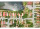 Aerial view of a community featuring well-maintained homes, mature trees, and a scenic lake with fountain at 6621 La Mesa Rd, Land O Lakes, FL 34637