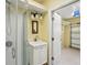 Bathroom showcasing a sink vanity and stand-up shower at 6621 La Mesa Rd, Land O Lakes, FL 34637