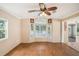 Dining room with hardwood flooring and a view of the lake at 6621 La Mesa Rd, Land O Lakes, FL 34637