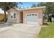 Charming home with an attached garage and large driveway at 6621 La Mesa Rd, Land O Lakes, FL 34637