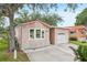 Well-maintained home with a spacious driveway and attached garage at 6621 La Mesa Rd, Land O Lakes, FL 34637