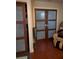Bedroom closet doors with semi-opaque glass panes and wood trim at 836 41St N Ave, St Petersburg, FL 33703