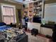 Bedroom with lots of storage and built in shelving and window seat for relaxing and enjoying natural light at 836 41St N Ave, St Petersburg, FL 33703