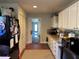 Kitchen with white cabinets, granite counters, and stainless steel appliances at 836 41St N Ave, St Petersburg, FL 33703