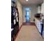 Kitchen with white cabinets, stainless appliances, and dark wood floors at 836 41St N Ave, St Petersburg, FL 33703