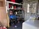 Functional laundry area with washer, dryer, and ample storage shelving for organization at 836 41St N Ave, St Petersburg, FL 33703