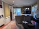 Comfortable living room with built in shelving, neutral paint, and an abundance of natural light from the window at 836 41St N Ave, St Petersburg, FL 33703