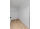 Walk-in closet with wire shelving and light wood flooring at 1103 Hardwood Dr, Valrico, FL 33596