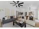 Open-concept living room features modern decor, neutral tones, and plenty of natural light at 1103 Hardwood Dr, Valrico, FL 33596