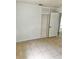 Bedroom featuring tiled floors, closet and white painted walls at 21077 Gertrude Ave, Port Charlotte, FL 33952