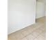Living room with tile flooring and white walls at 21077 Gertrude Ave, Port Charlotte, FL 33952