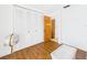 Cozy bedroom features a spacious closet and wood-look flooring for warmth and style at 2700 Bayshore Blvd # 3210, Dunedin, FL 34698