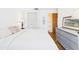 Bedroom with a serene atmosphere, ample natural light, and convenient closet and bathroom access at 2700 Bayshore Blvd # 3210, Dunedin, FL 34698