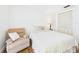 Bedroom with a comfortable chair and a serene atmosphere, great for relaxation at 2700 Bayshore Blvd # 3210, Dunedin, FL 34698