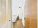 Serene bedroom with warm wood flooring and closet is perfect for relaxation at 2700 Bayshore Blvd # 3210, Dunedin, FL 34698
