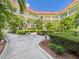 Beautiful courtyard with tropical landscaping and multiple levels in a condominium complex at 2700 Bayshore Blvd # 3210, Dunedin, FL 34698