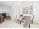 Bright dining room with adjacent hallway, view to living room and closet at 2700 Bayshore Blvd # 3210, Dunedin, FL 34698