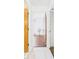 Hallway showing wood-look floors and an open doorway to the bedroom at 2700 Bayshore Blvd # 3210, Dunedin, FL 34698