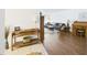 Inviting living room with wood floors, a console table, and a comfortable sofa at 2700 Bayshore Blvd # 3210, Dunedin, FL 34698