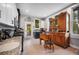 Well-lit kitchen with white cabinets, dark countertops, and stainless steel appliances at 1007 N Wheeler St, Plant City, FL 33563
