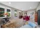 Bright living room with elegant furniture and large windows offering ample natural light at 1007 N Wheeler St, Plant City, FL 33563
