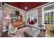 A charming living room showcasing vintage furniture and unique wallpaper at 1007 N Wheeler St, Plant City, FL 33563
