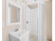 Compact bathroom design showcasing a modern sink and shower, offering a clean and efficient space at 3620 E Tampa Cir, Tampa, FL 33629