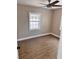 Cozy bedroom with new flooring and a ceiling fan at 3620 E Tampa Cir, Tampa, FL 33629
