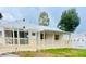 Charming single-story home featuring a spacious porch and well-maintained landscaping at 3620 E Tampa Cir, Tampa, FL 33629