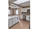 Bright kitchen boasts a large island, stainless steel appliances, and a stylish backsplash at 3620 E Tampa Cir, Tampa, FL 33629