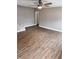 A spacious living room featuring modern floors and access to multiple rooms at 3620 E Tampa Cir, Tampa, FL 33629