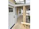 Entranceway features covered porch and walkway leading to the home's entry point at 3620 E Tampa Cir, Tampa, FL 33629