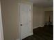 A room featuring freshly painted walls, modern flooring, and a neatly fitted door at 3620 E Tampa Cir, Tampa, FL 33629