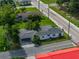 Overhead perspective of a home with a detached garage, highlighting the property's overall dimensions and positioning at 602 E Laura St, Plant City, FL 33563