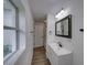 Bright renovated bathroom featuring a new vanity and fixtures at 602 E Laura St, Plant City, FL 33563
