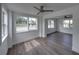 Inviting living space with large windows, modern flooring, and white walls, creating a serene atmosphere at 602 E Laura St, Plant City, FL 33563