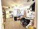 Cluttered bedroom with full wall mirrors and carpet at 7943 Woodvine Cir, Tampa, FL 33615