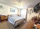 Bedroom with coastal decor and plenty of storage at 7943 Woodvine Cir, Tampa, FL 33615